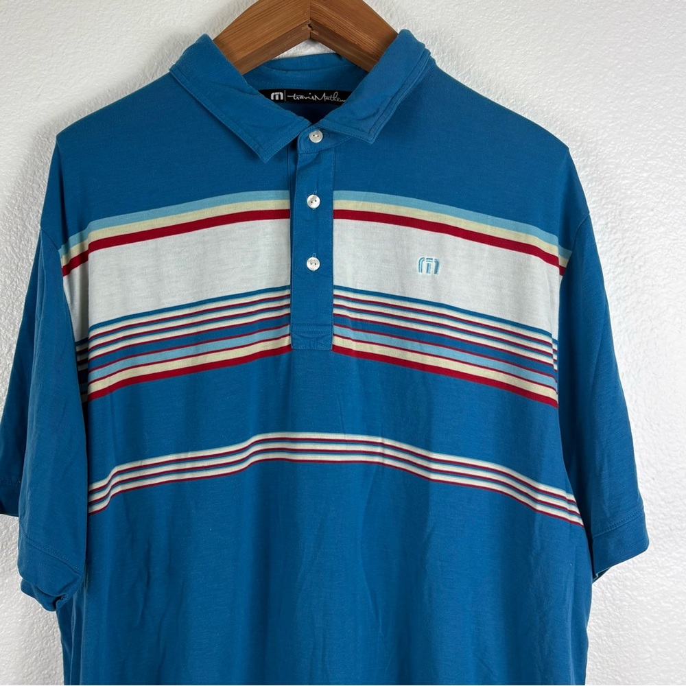 Travis Mathew Teal Blue Polo with Multicolor Chest Stripes